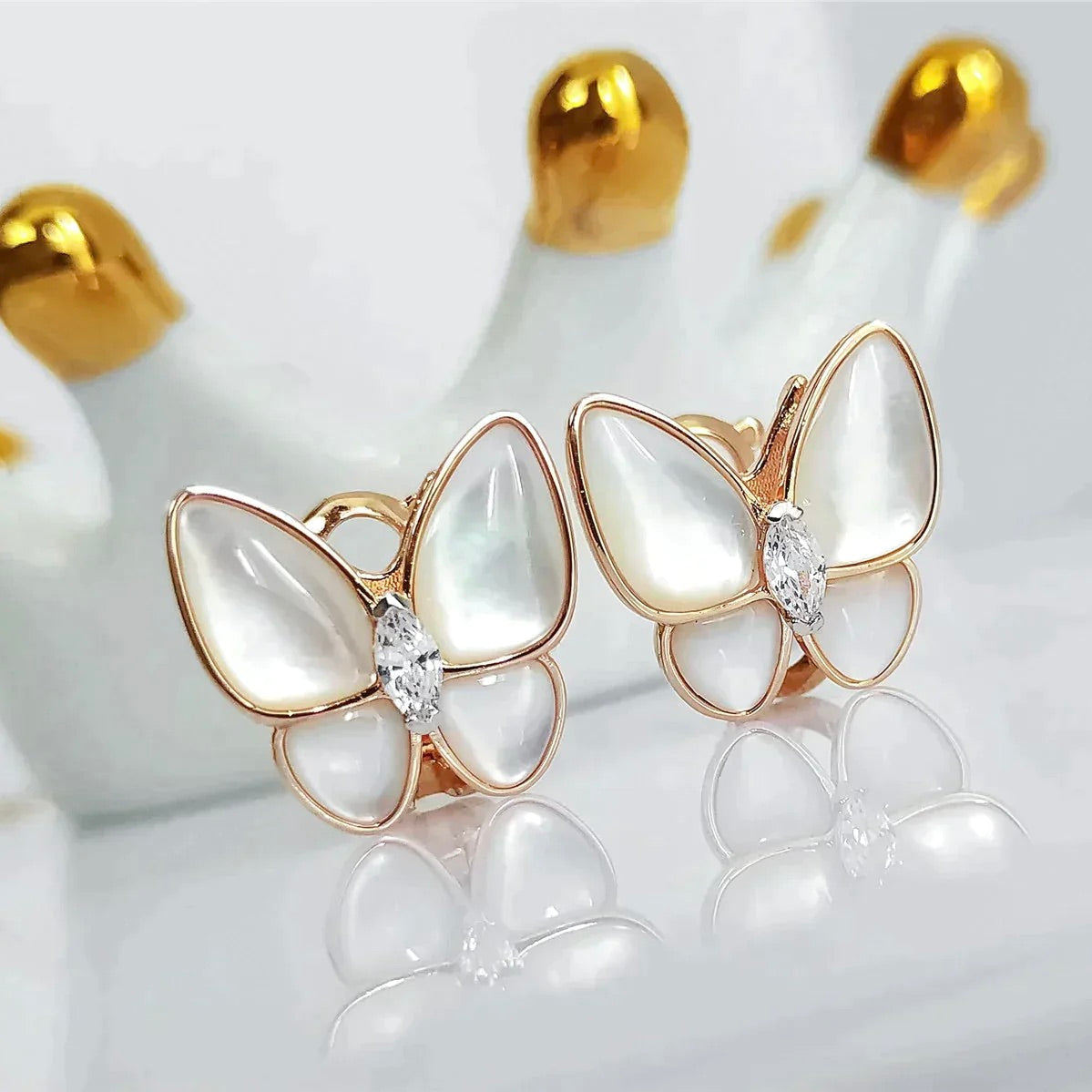 GlowBUTTERFLY MOP DIAMOND EARRINGS