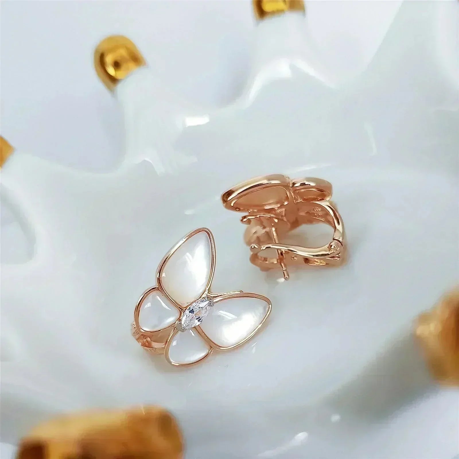 GlowBUTTERFLY MOP DIAMOND EARRINGS
