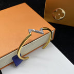 GlowVOLTE UPSITE DOWN DIAMOND GOLD OPEN BRACELET