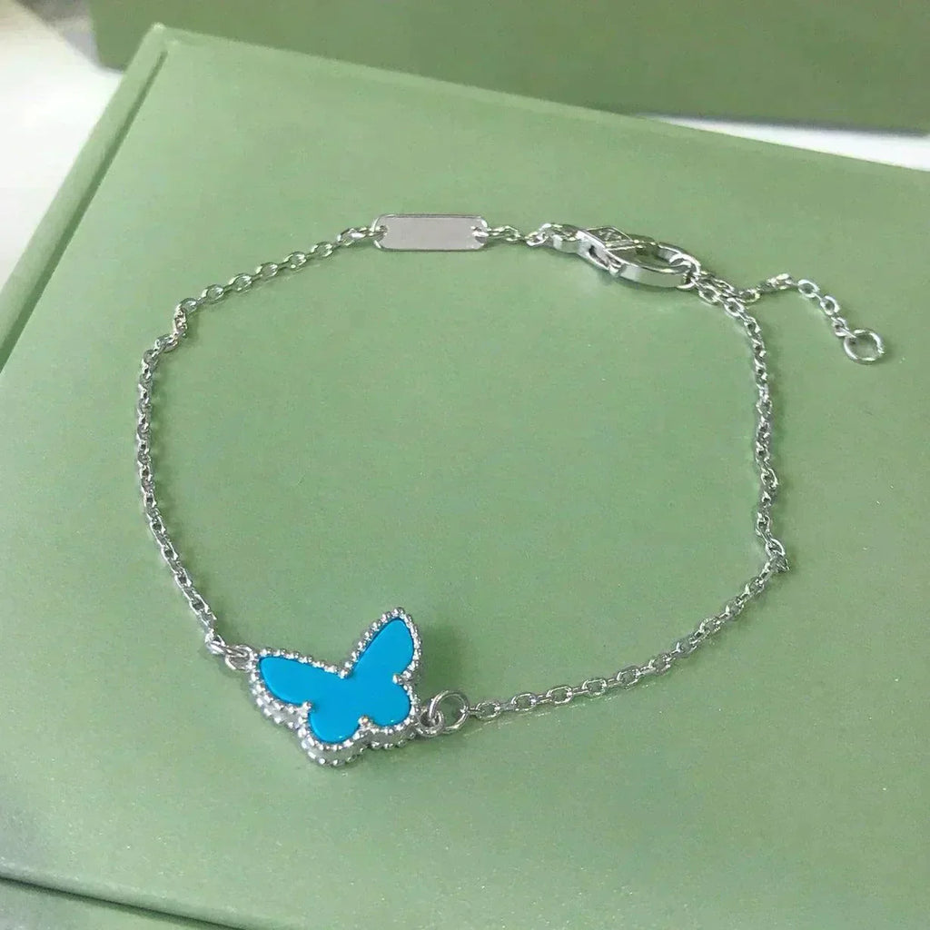 GlowBUTTERFLY TURQUOISE BUTTERFLY BRACELET SILVER