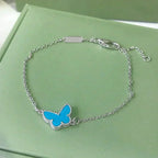 GlowBUTTERFLY TURQUOISE BUTTERFLY BRACELET SILVER