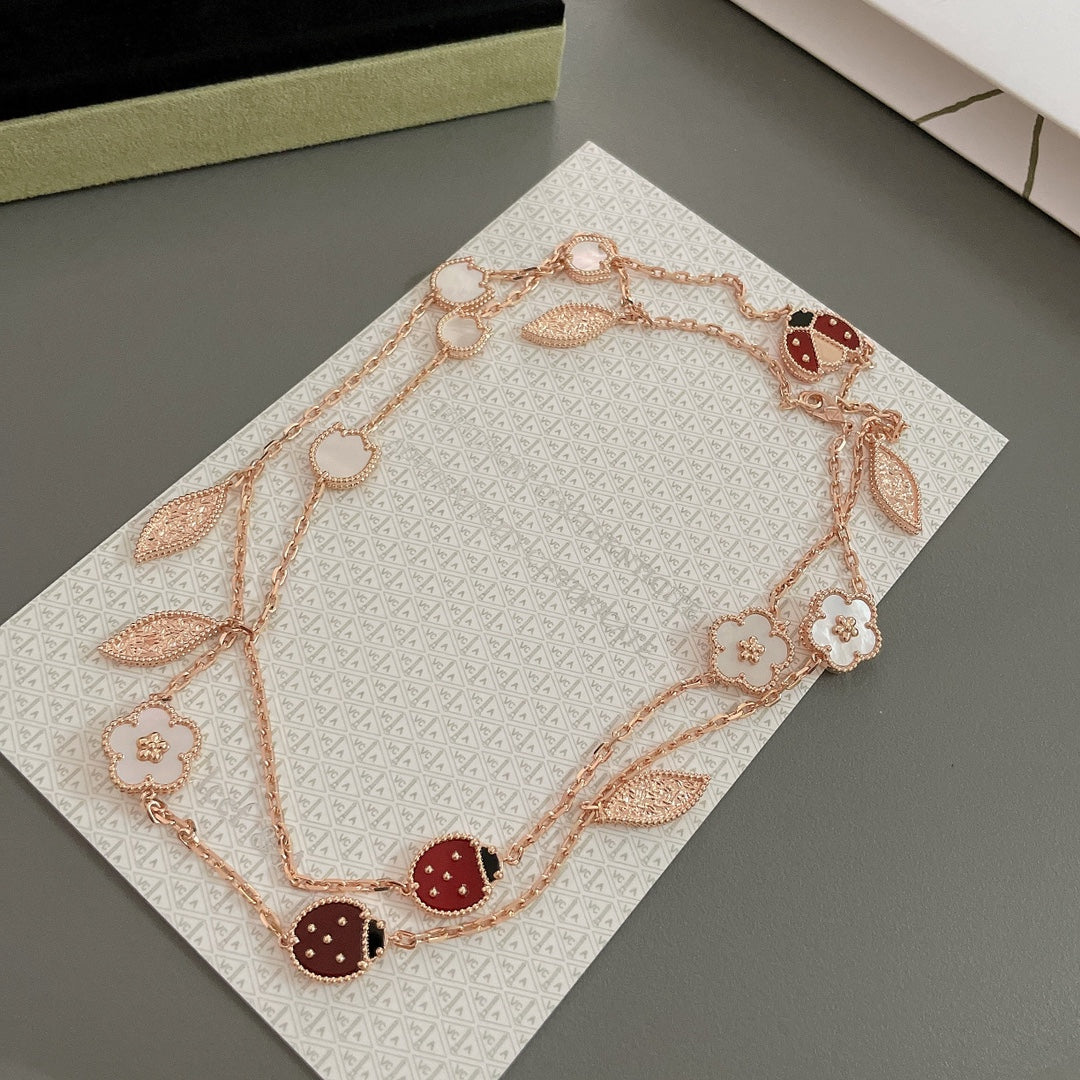 GlowLUCKY SPRING 15 MOTIFS ROSE GOLD NECKLACE