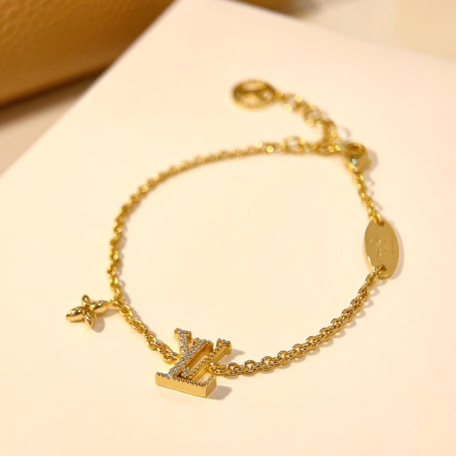 GlowLOGO STAR MOTIF GOLD BRACELET