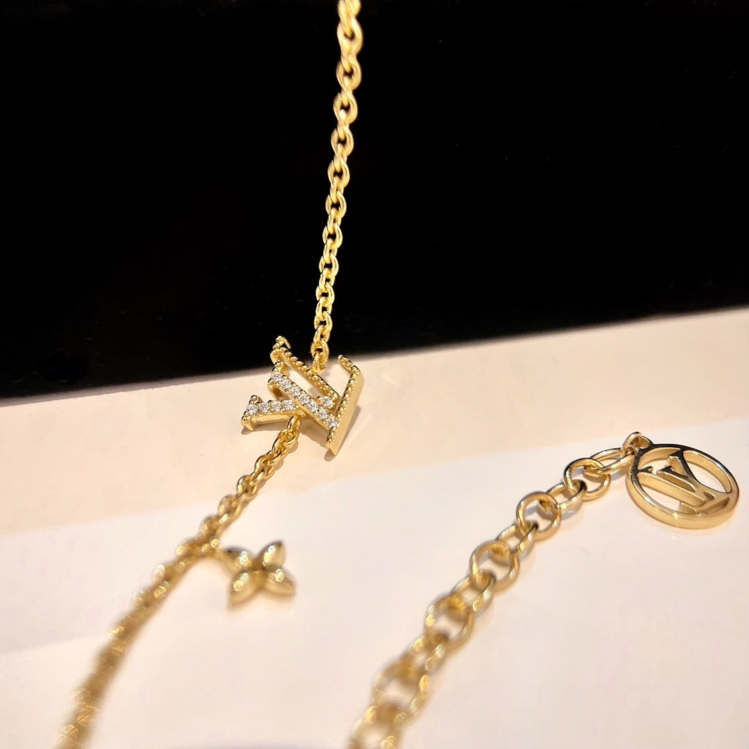 GlowLOGO STAR MOTIF GOLD BRACELET