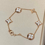 GlowSTAR AND SUN 5 MOTIF MOP PINK GOLD BRACELET