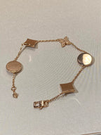 GlowSTAR AND SUN 5 MOTIF MOP PINK GOLD BRACELET