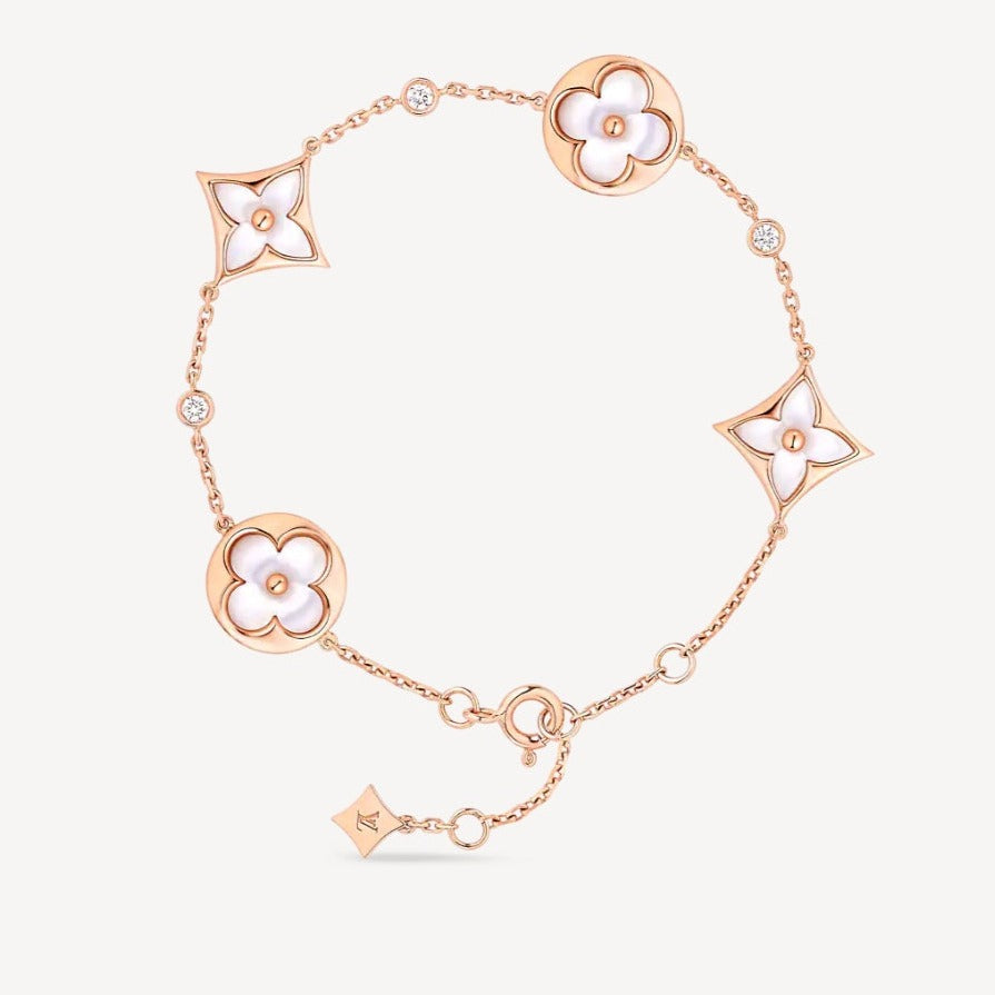 GlowSTAR AND SUN 4 MOTIF WHITE MOP PINK GOLD BRACELET