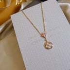GlowSTAR AND SUN WHITE MOP 2 MOTIF PINK GOLD NECKLACE