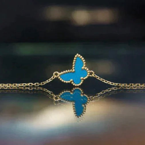GlowBUTTERFLY TURQUOISE BUTTERFLY BRACELET