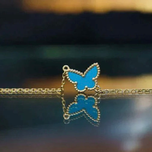 GlowBUTTERFLY TURQUOISE BUTTERFLY BRACELET