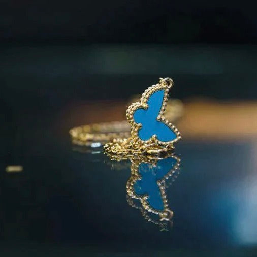 GlowBUTTERFLY TURQUOISE BUTTERFLY BRACELET