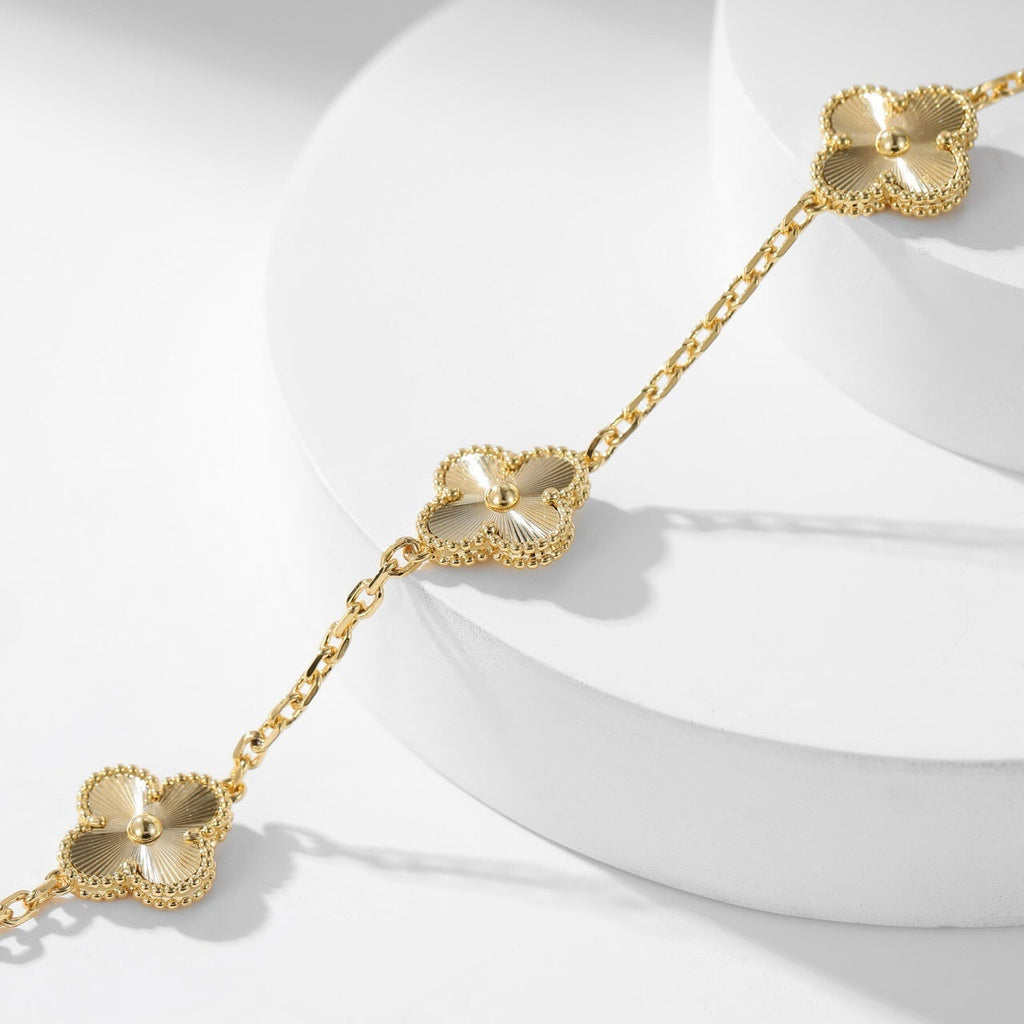 GlowCLOVER 10 MOTIFS LASER NECKLACE