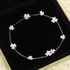 GlowFRIVOLE SILVER 9 FLOWERS NECKLACE