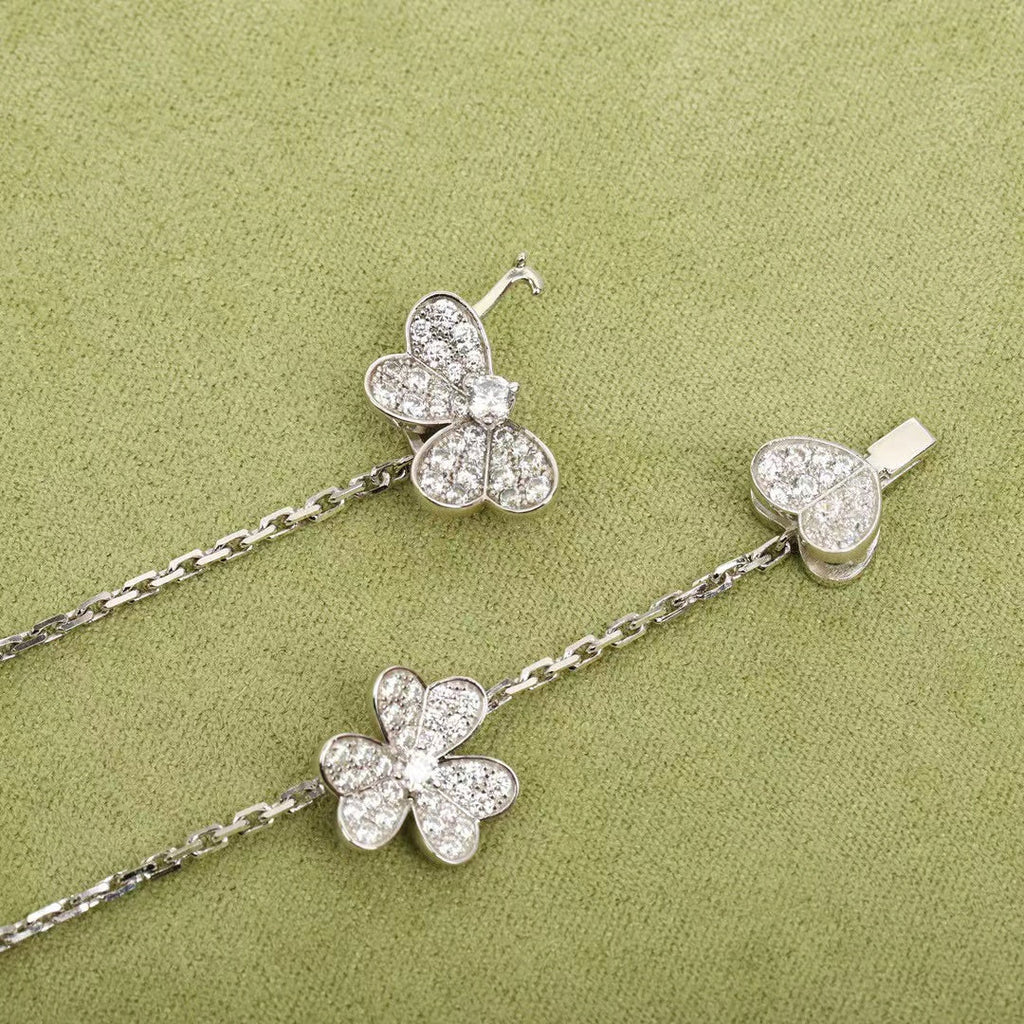 GlowFRIVOLE SILVER 9 FLOWERS NECKLACE