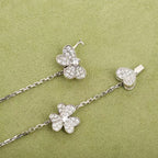 GlowFRIVOLE SILVER 9 FLOWERS NECKLACE