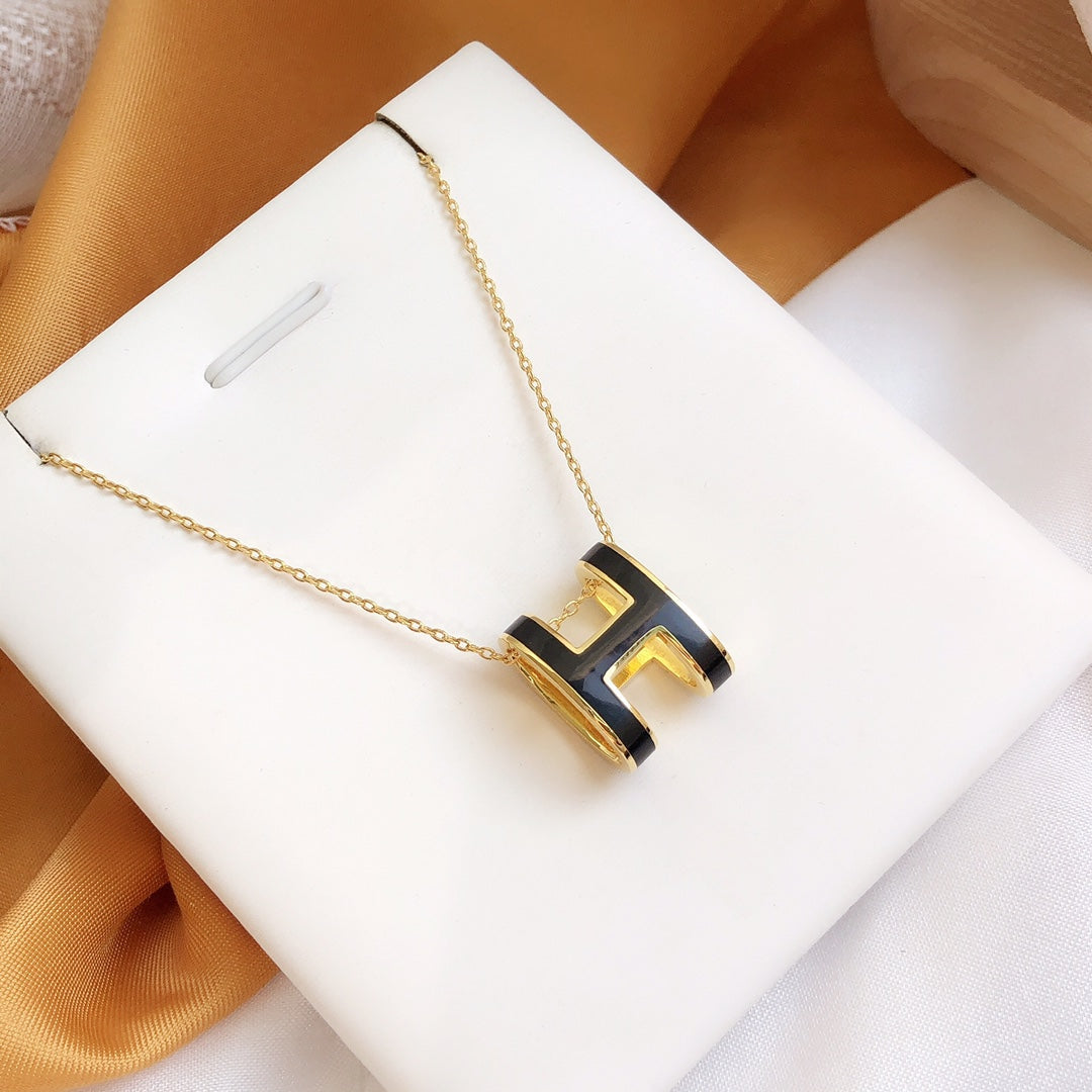 GlowHM CLIC BLACK ENAMEL GOLD NECKLACE